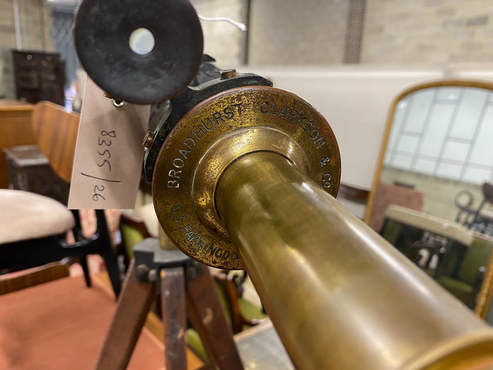 An early 20th century, Broadhurst and Clarkson astronomical telescope on folding tripod, the telescope length 110cm